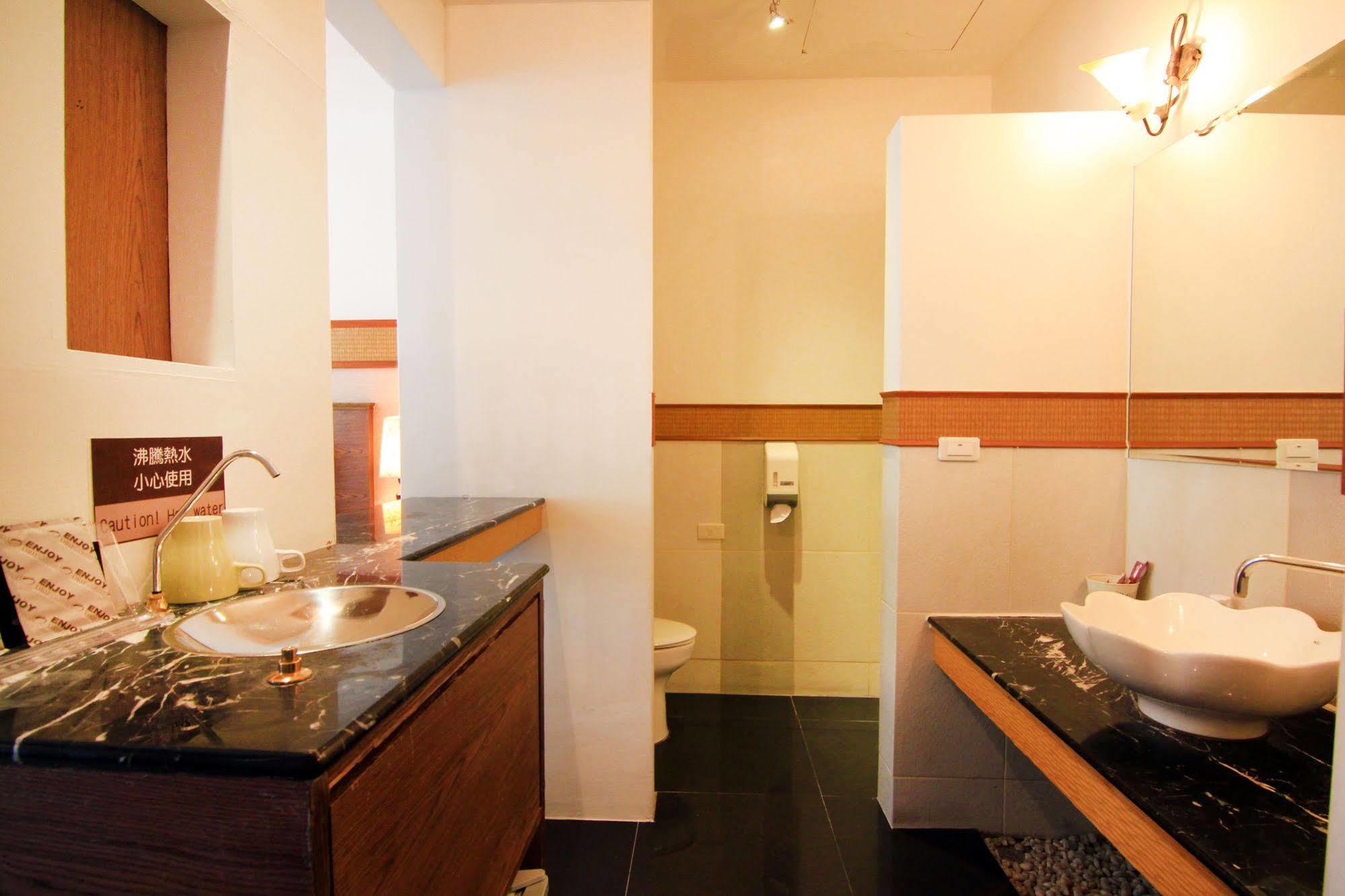 Palm Villa Guesthouse Nantou Bagian luar foto